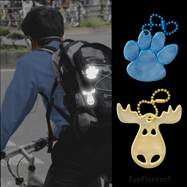 Backpack with paw print. and moose safety reflectors for biking by funflector