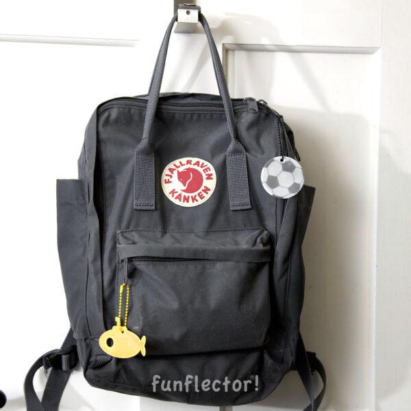 Kanken backpack with submarine and soccer ball safety reflectors