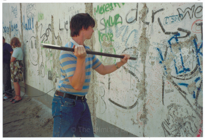 Hacking at the Berlin wall in July 1990.