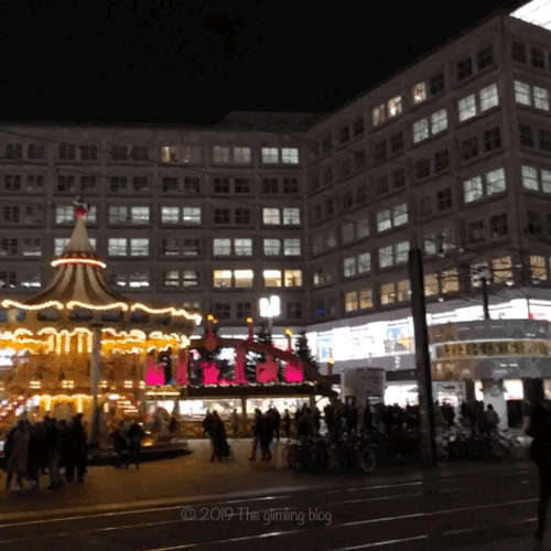 The Christmas market at Alexanderplatz has a two-story carousel next to the iconic world clock.