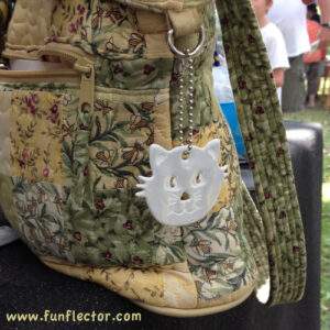 funflector kitten safety reflector on purse