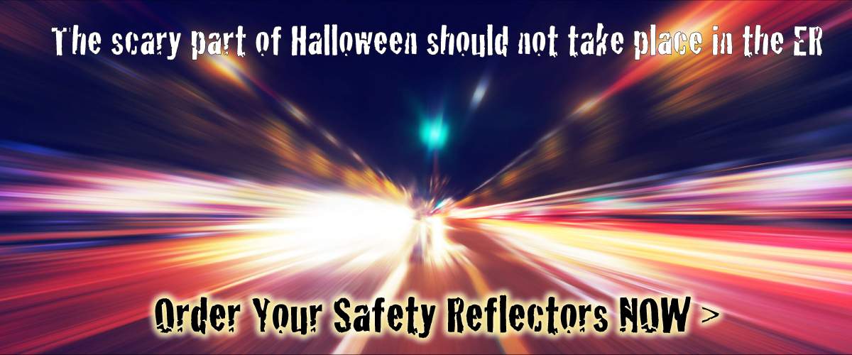 Busy traffic background with text: The scary part of Halloween should not take place in the ER. Order your safety reflectors now