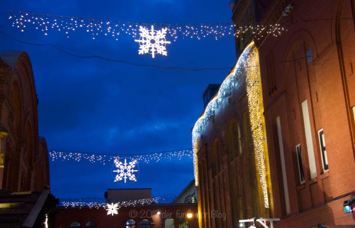 Lights across the courtyard of the "Kulturbrauerei" where the Lucia Christmas Market takes place.