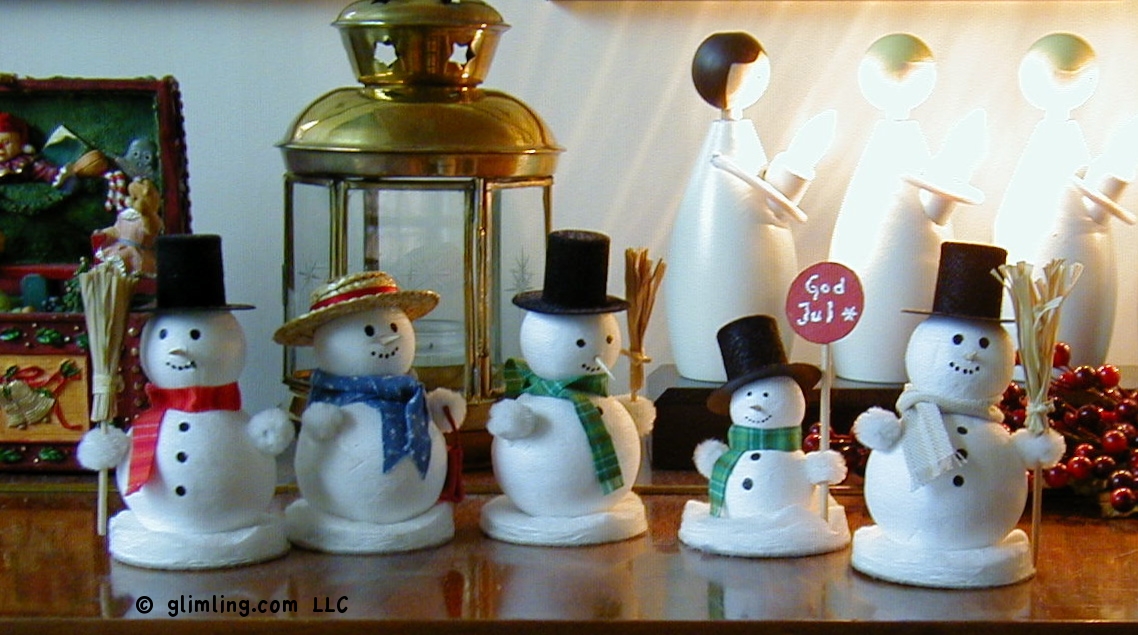 Snowmen wishing Merry Christmas