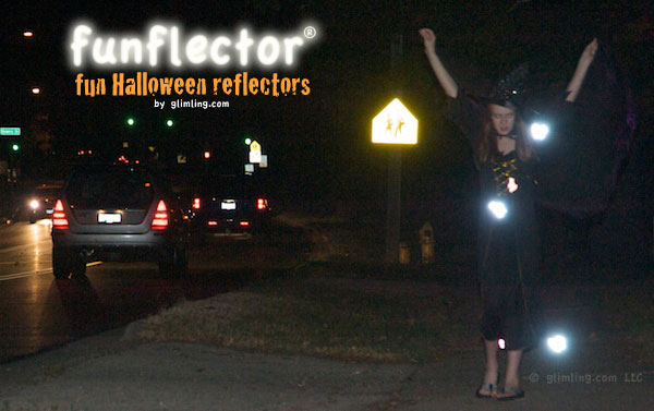 Witch with Halloween safety reflectors along busy road 