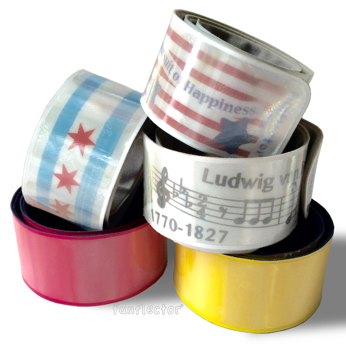 Reflective slap bracelets in cheerful colors and designs